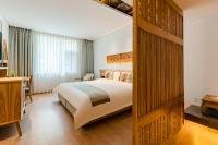 Yoba Boutique Hotel客房内的一张或多张床位