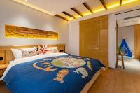 Yoba Boutique Hotel客房内的一张或多张床位
