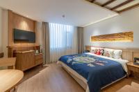 Yoba Boutique Hotel客房内的一张或多张床位