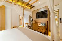 Yoba Boutique Hotel客房内的一张或多张床位