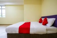 Happy Inn Hotel客房内的一张或多张床位