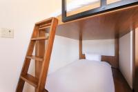 QuintessaHotel KagoshimaTenmonkan Relax&Sleep客房内的一张或多张床位