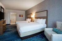 Homewood Suites By Hilton Myrtle Beach Coastal Grand Mall客房内的一张或多张床位