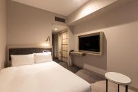Hotel Keihan Nagoya客房内的一张或多张床位