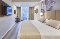 Riu Plaza Manhattan Times Square客房内的一张或多张床位