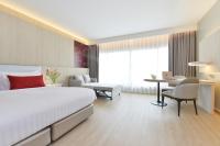 Centre Point Plus Hotel Pratunam客房内的一张或多张床位