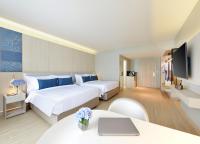 Centre Point Plus Hotel Pratunam客房内的一张或多张床位