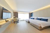 Centre Point Plus Hotel Pratunam客房内的一张或多张床位