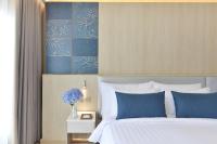Centre Point Plus Hotel Pratunam客房内的一张或多张床位