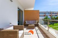 #154 V2 Vila Branca 54 by Home Holidays的休息区