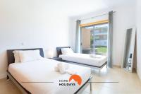 #154 V2 Vila Branca 54 by Home Holidays客房内的一张或多张床位