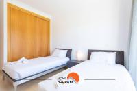 #154 V2 Vila Branca 54 by Home Holidays客房内的一张或多张床位