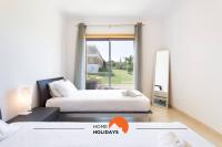 #154 V2 Vila Branca 54 by Home Holidays客房内的一张或多张床位