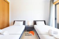 #154 V2 Vila Branca 54 by Home Holidays客房内的一张或多张床位