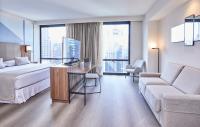 Riu Plaza Manhattan Times Square客房内的一张或多张床位