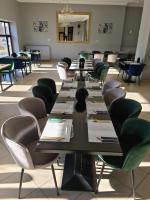 Kakukk Panzió餐厅或其他用餐的地方