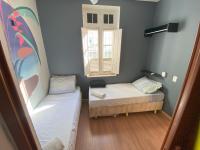 Aurora Hostel Rio客房内的一张或多张床位