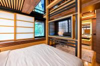 Hanami Design Hotel客房内的一张或多张床位