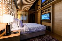 Hanami Design Hotel客房内的一张或多张床位