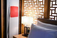 Hanami Design Hotel客房内的一张或多张床位