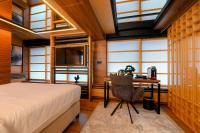Hanami Design Hotel客房内的一张或多张床位