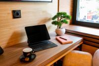 Hanami Design Hotel的电视和/或娱乐中心