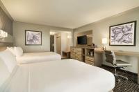 Hilton Melbourne, FL客房内的一张或多张床位