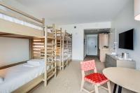 The Lodge at Gulf State Park, A Hilton Hotel客房内的一张或多张床位