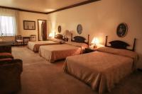 Nobile Suites Excelsior Asuncion客房内的一张或多张床位