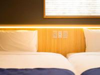 NK Hotels客房内的一张或多张床位