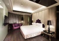 Ramada Encore By Wyndham Hualien客房内的一张或多张床位