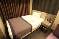 Almont Inn Tokyo Nihonbashi客房内的一张或多张床位