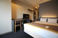 Almont Inn Tokyo Nihonbashi客房内的一张或多张床位
