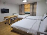 SHseoul客房内的一张或多张床位
