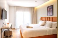 Hotel Shoshana - Adults Only客房内的一张或多张床位