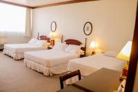 Nobile Suites Excelsior Asuncion客房内的一张或多张床位