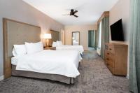 Homewood Suites By Hilton Albuquerque Downtown客房内的一张或多张床位
