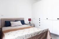 Luxury Labone Edge 2-bedroom apartment in Accra - FiveHills homes客房内的一张或多张床位