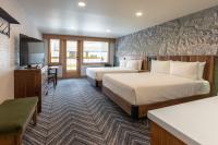 Hotel Canoe and Suites客房内的一张或多张床位