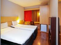 ibis Recife Boa Viagem客房内的一张或多张床位