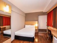 ibis Recife Boa Viagem客房内的一张或多张床位