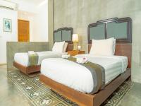 Tanei Angkor Resort and Spa客房内的一张或多张床位