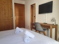 Cham&#39;Heart, 4-star apartments in Chamonix centre with free private parking客房内的一张或多张床位