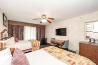 Bellissimo Hotel, Trademark by Wyndham Near Foxwoods Casino客房内的一张或多张床位