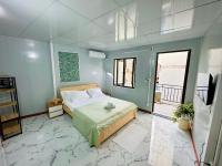 Local Me - Exclusive Centre Room客房内的一张或多张床位