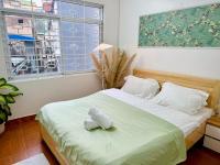 Local Me - Exclusive Centre Room客房内的一张或多张床位