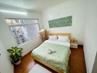 Local Me - Exclusive Centre Room客房内的一张或多张床位