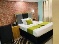 Shamrockmanor(TheResidence)客房内的一张或多张床位