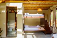 Casa Mambo Salinas客房内的一张或多张床位