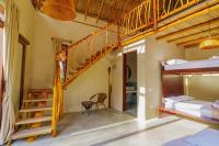 Casa Mambo Salinas客房内的一张或多张床位